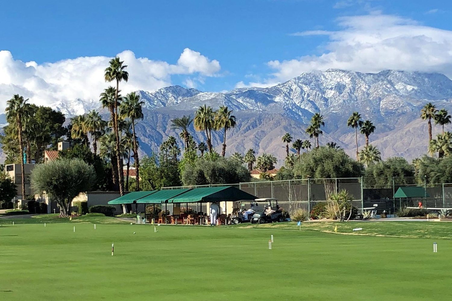 Snow-capped Santa Rosa Mountains above the lawns and pavilion